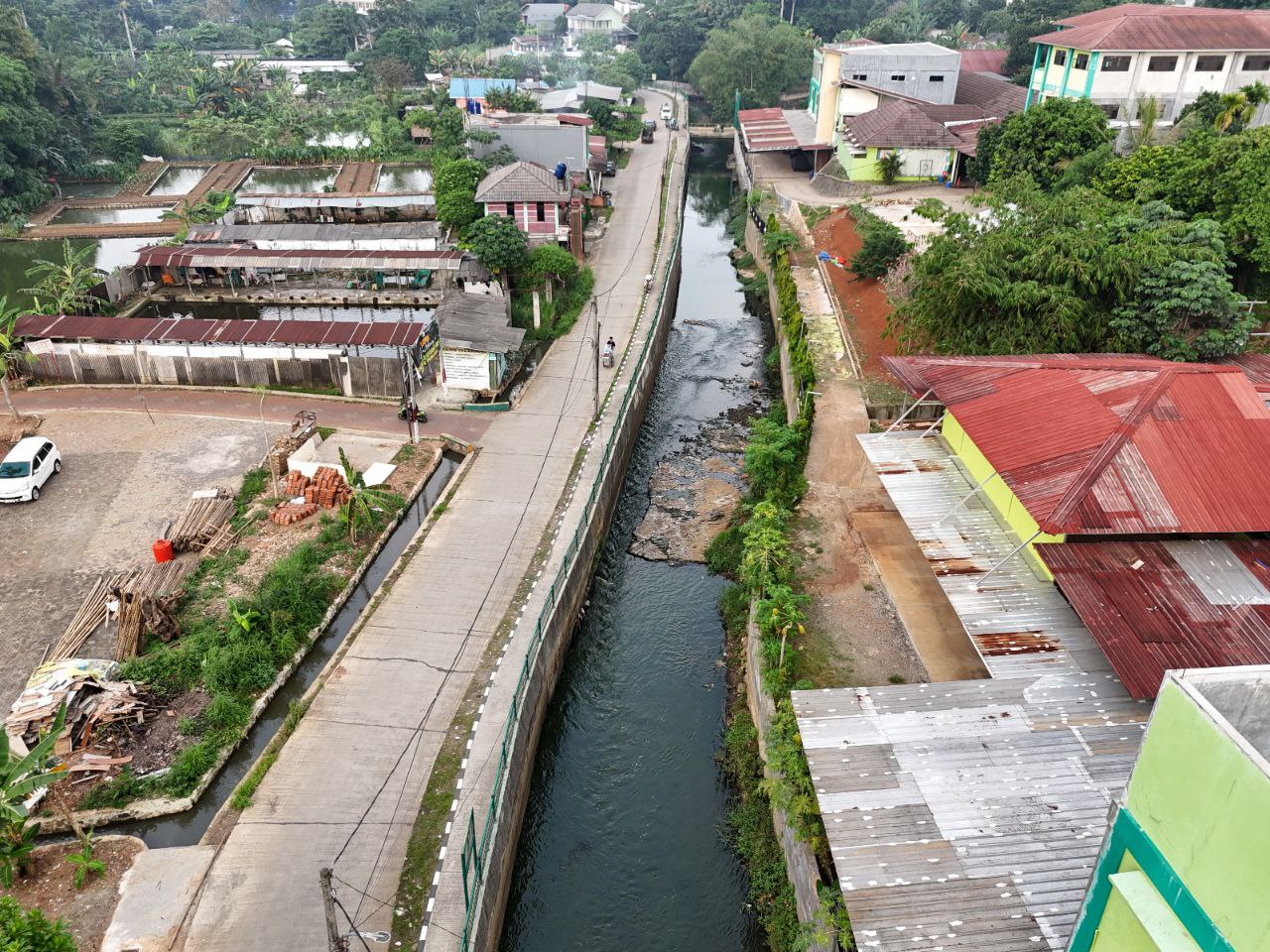 Pemkot Tangsel tambah kapasitas sungai setelah bangun tandon, untuk kendalikan banjir. (Dok.Humas Pemkot Tangsel)