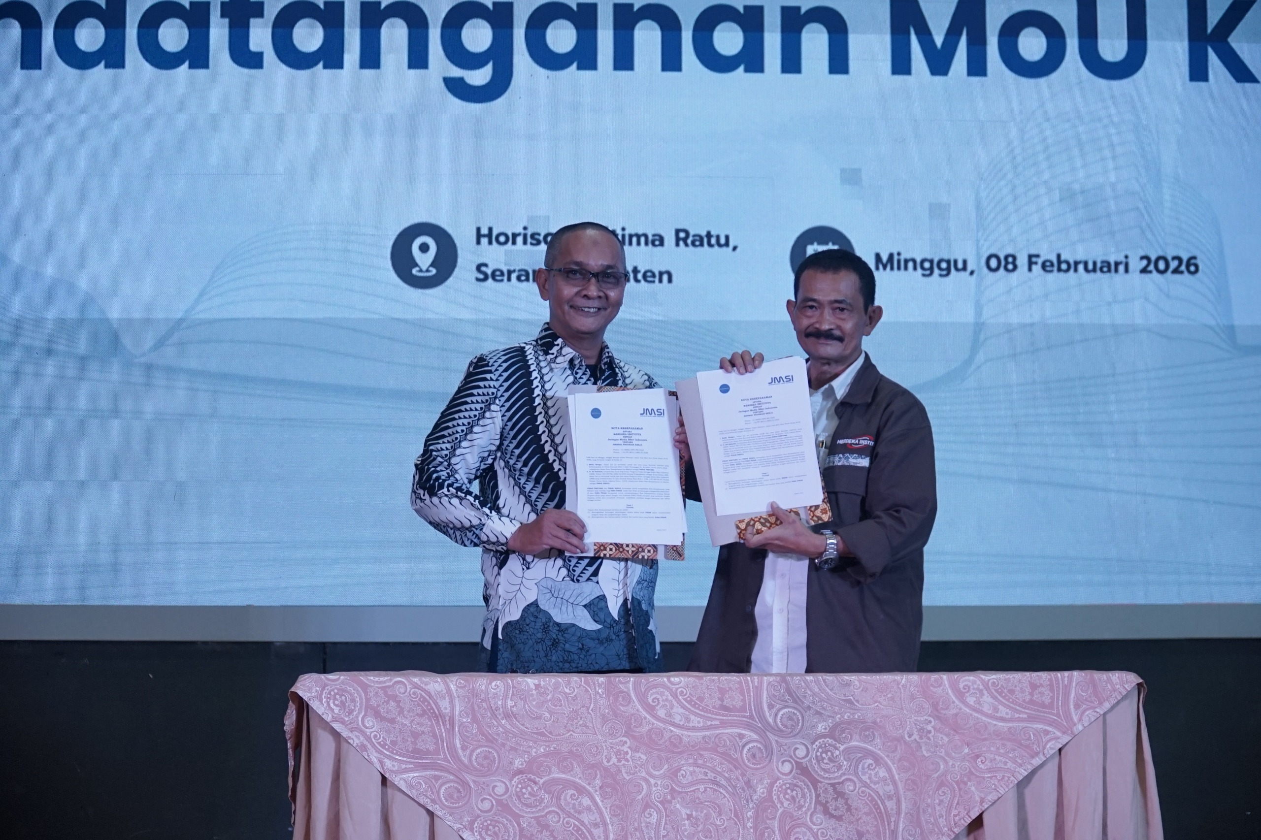 PT. Merdeka Solusi Inovasi Digital (Merdeka Institute) melakukan penandatangan kerjasama (Memorandum of Understanding/MoU) dengan Jaringan Media Siber Indonesia (JMSI).(Istimewa)