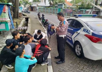 Sekelompok pelajar saat terjaring aparat Polres Metro Tangerang saat akan nge-BM di Jalan Daan Mogot, Kota Tangerang. Foto : Istimewa