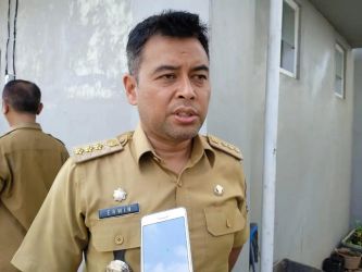 Camat Setu Erwin Gemala Putra.