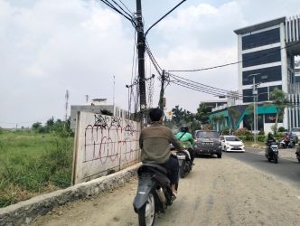 Kondisi Jalan Maruga Raya yang akan dilakukan peninggian badan jalan. Foto : Ist